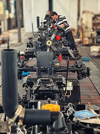 Modern tractor assembly line production at Xingtai Agricultural Machinery factory.